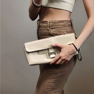 Mondani faux leather cream clutch hand bag
